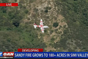Two elementary schools in California evacuated as a rapidly spreading brush fire in Simi Valley burns, now covering 720 acres.
