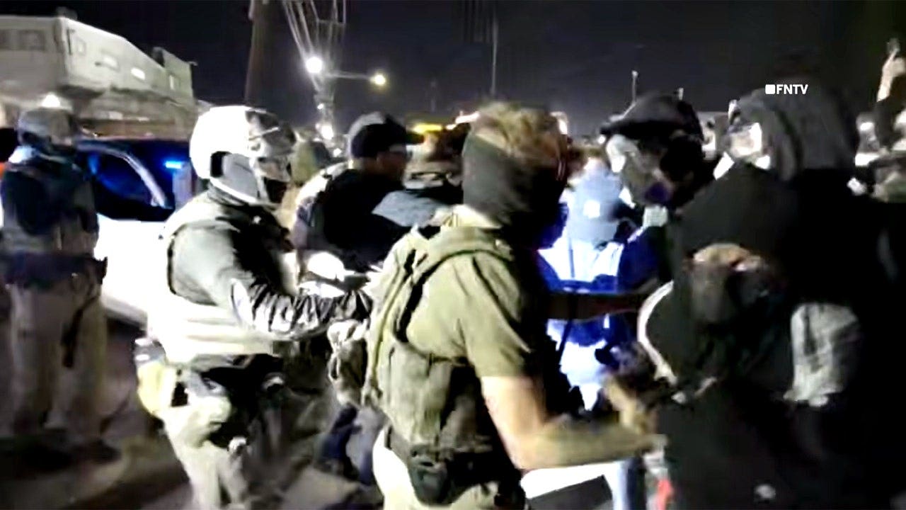 Two people arrested after anti-ICE protesters attack officers in Newark