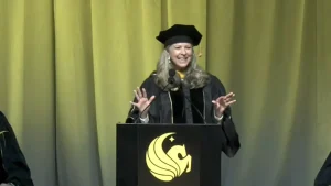 UCF graduates express disapproval of commencement speaker due to controversial AI remarks.