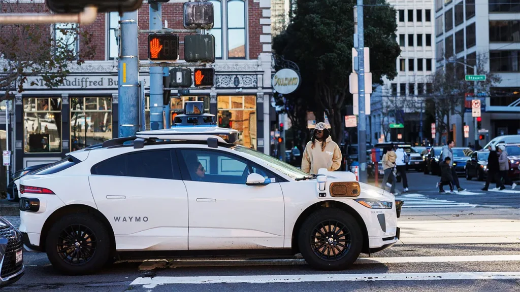 Waymo suspends robotaxi service on highways nationwide due to safety issues.
