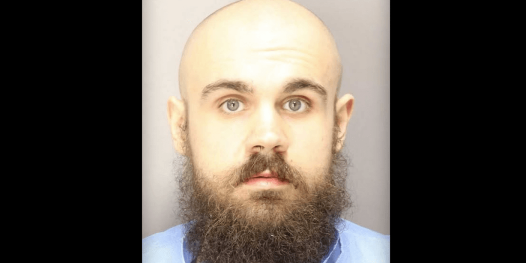 25-year-old man charged with the murder of his mother, father, brother, and brother's girlfriend