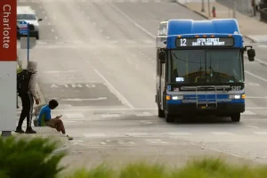 A city's effort to implement facial recognition on public buses sparks discussion about security and privacy.