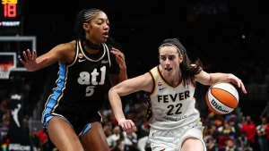 Angel Reese discusses singing the Black National Anthem despite being booed by Fever fans.