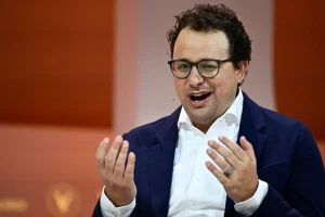 Anthropic urges a worldwide pause on AI development following a $965B valuation, while critics argue it's meant to weaken rivals.