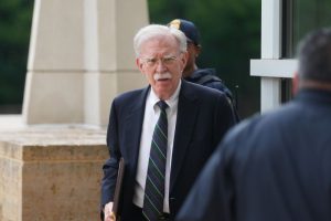 Bolton admits guilt in a plea agreement for holding classified documents.