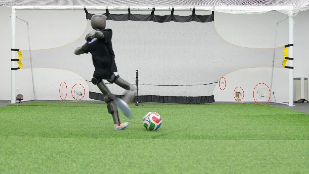 Booster Robotics T1 robot hits soccer balls with enough force to leave dents in walls