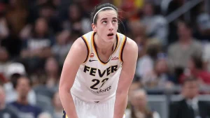 Caitlin Clark exits Fever game versus Mercury due to back injury.