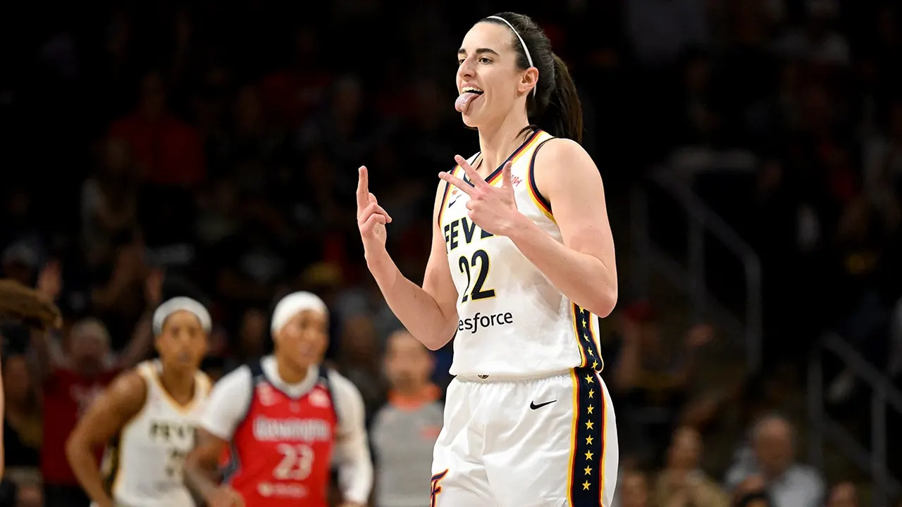 Caitlin Clark makes a crucial 31-foot shot to lead the Fever past the Mystics 78-76