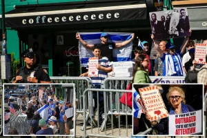 Demonstrators confront each other outside a Brooklyn coffee shop opposing Israel as police keep the two groups apart.
