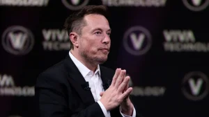 Elon Musk no longer holds trillionaire status as tech downturn affects Tesla and SpaceX.