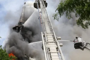 Fire consumes historic 173-year-old NYC church, leading to the fall of its worn steeple.