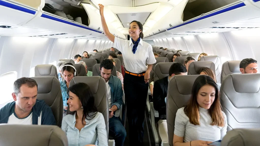 Flight attendants ask passengers to refrain from touching them for attention.