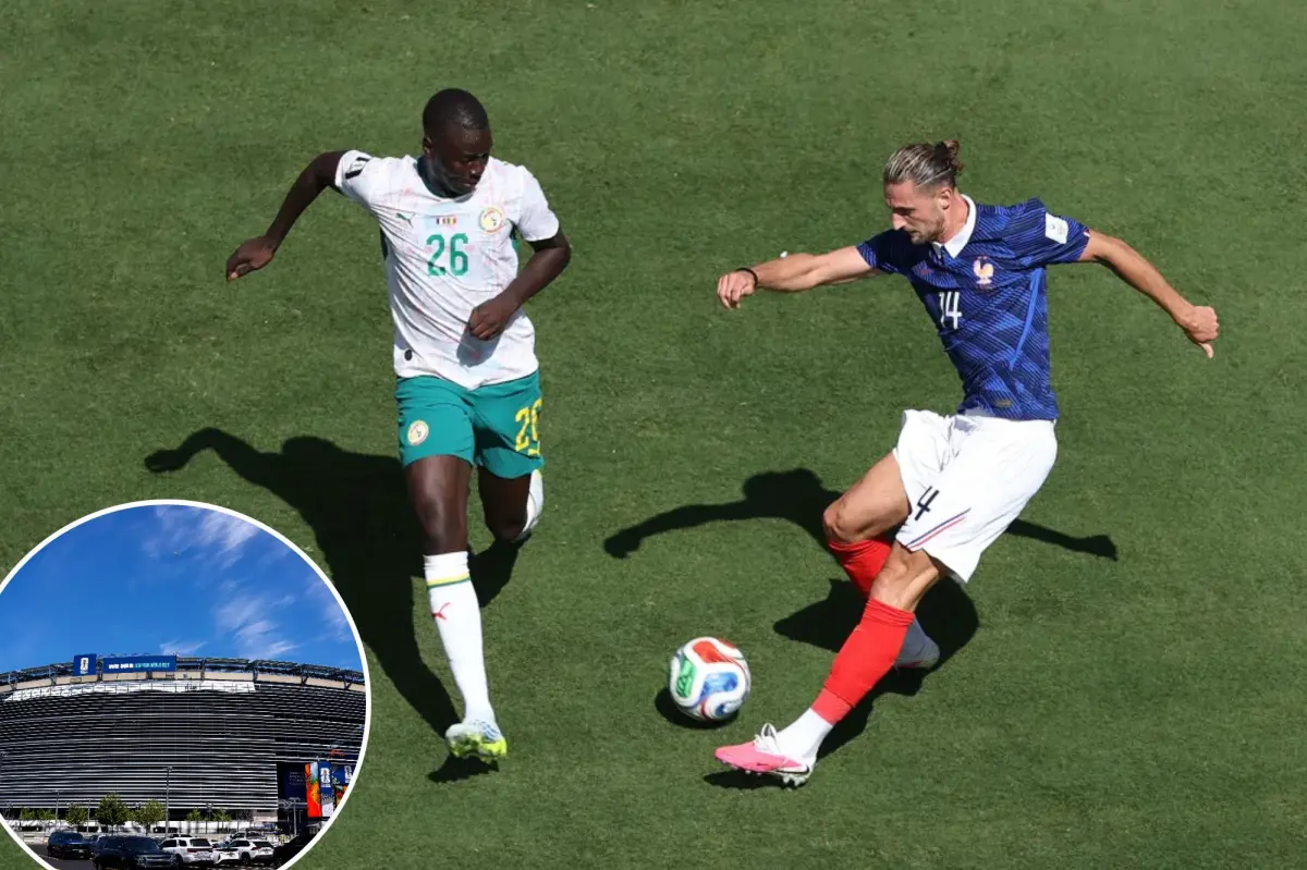 France's Adrien Rabiot expresses frustration about the difficult pitch at MetLife Stadium during the World Cup
