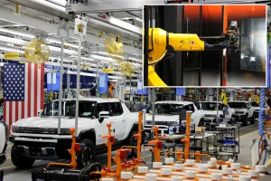 GM swaps over 1,000 employees for 50 robots at its main Detroit facility