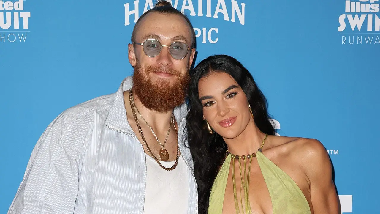 George Kittle believes he exceeded expectations as his wife Claire fulfilled her dreams of being an SI Swimsuit model.