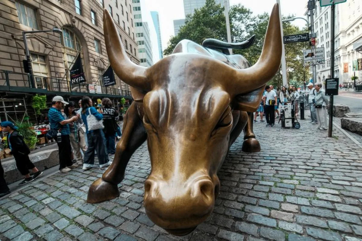 Global stocks slip as tech downturn weighs on markets