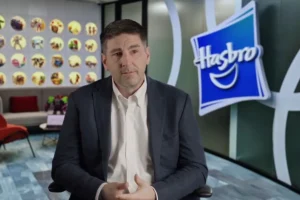 Hasbro executive witnessed the American dream while his family welcomed 250 foster children.