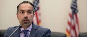 He alleges that a media smear campaign was aimed at deporting a well-known critic of the Iran war.