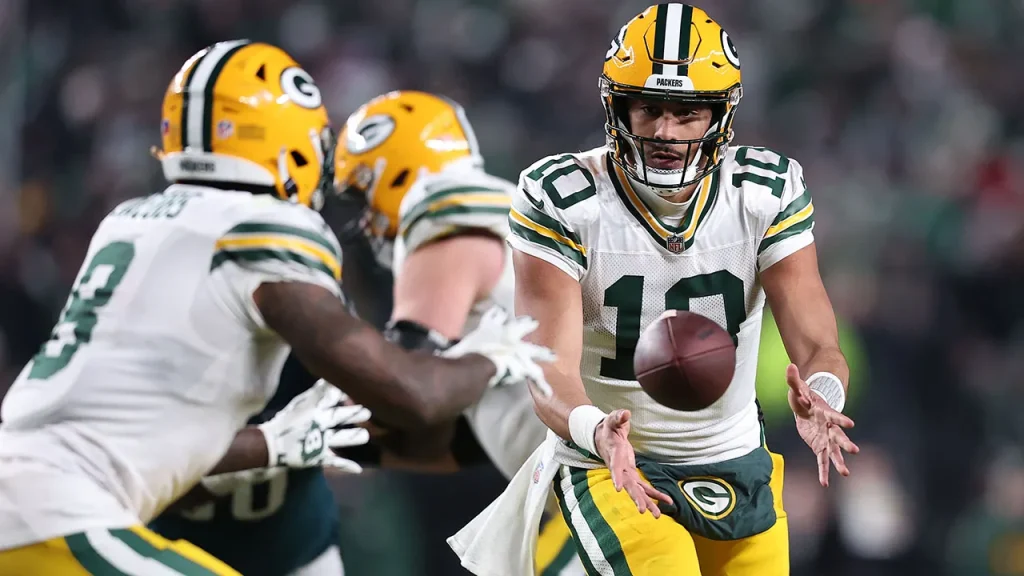Jordan Love expresses surprise over Josh Jacobs' arrest on felony charges.