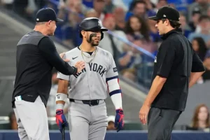Jose Caballero of the Yankees asks for clarity on pitch clock rules following a tense exchange with an umpire.