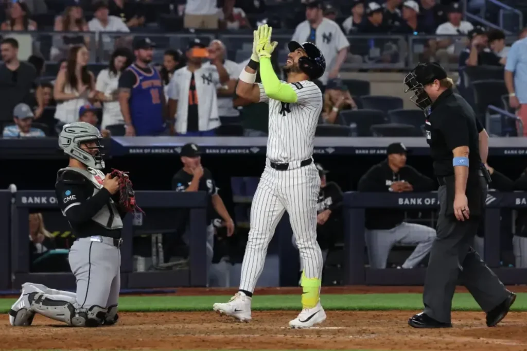 Jose Caballero of the Yankees looks for clarity on the pitch clock rule
