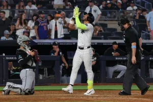 Jose Caballero of the Yankees looks for clarity on the pitch clock rule