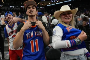 Knicks fans rush to secure travel plans to San Antonio for Game 5 after a storm disrupts travel.