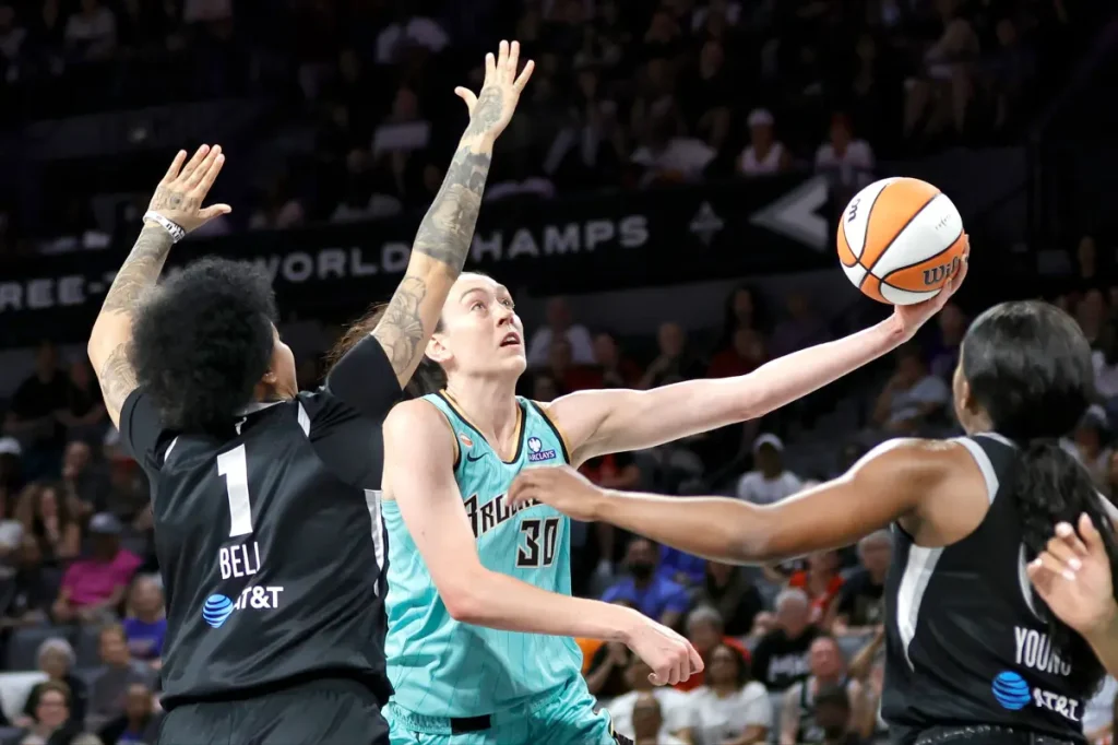 Liberty withstand Aces' late push to secure road victory against rival