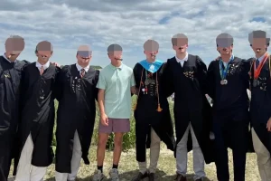 Massachusetts high school lacrosse team gives up playoff match due to cigar photo — parents assert they were not real.