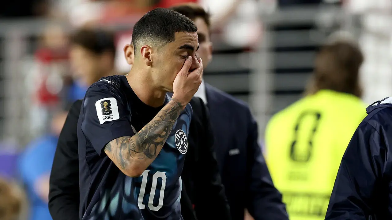 Miguel Almiron from Paraguay is the first player sent off due to FIFA's new mouth-covering rule during the World Cup.