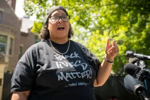 Minnesota school board member Chauntyll Allen suggests that dogs should relieve themselves on white bodies.