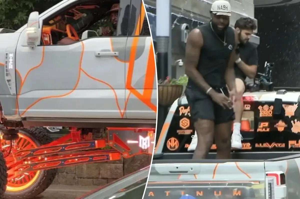 Mitchell Robinson cruising in customized truck at Knicks parade