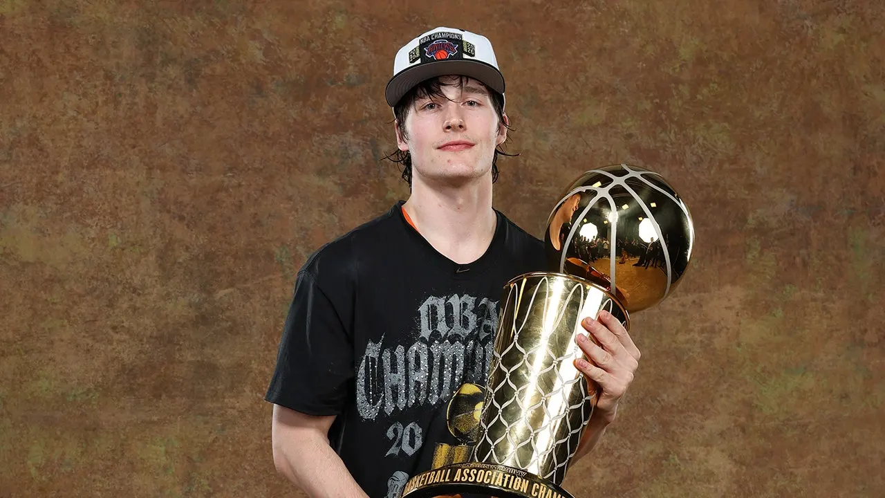 NYPD officers halt Knicks player Tyler Kolek at championship parade in widely shared incident