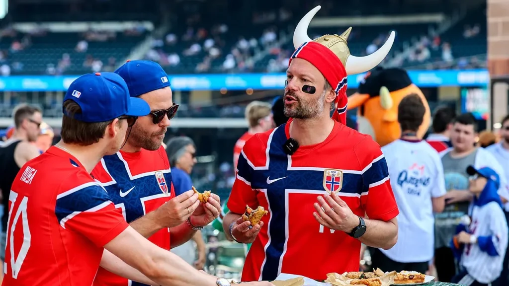 Norwegian World Cup supporters transform Citi Field seating into a Viking longship during Mets game