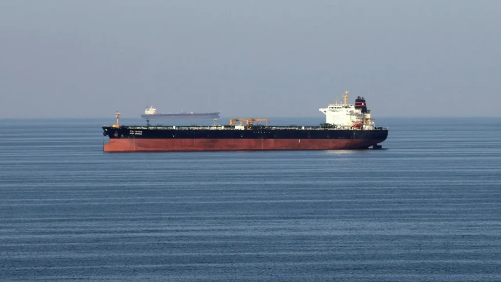 Oil prices decrease as shipping through the Strait of Hormuz increases, despite mine risks