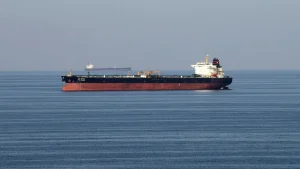 Oil prices decrease as shipping through the Strait of Hormuz increases, despite mine risks