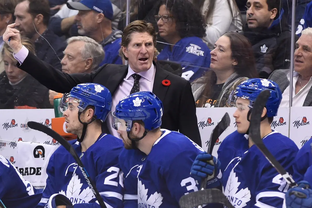 Oilers seek to bring on Mike Babcock three years after the Blue Jackets photo incident.