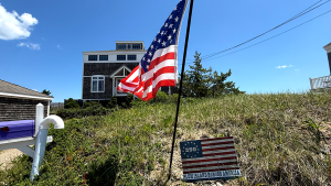 Residents of a Massachusetts town cautioned that American flags might breach species regulations