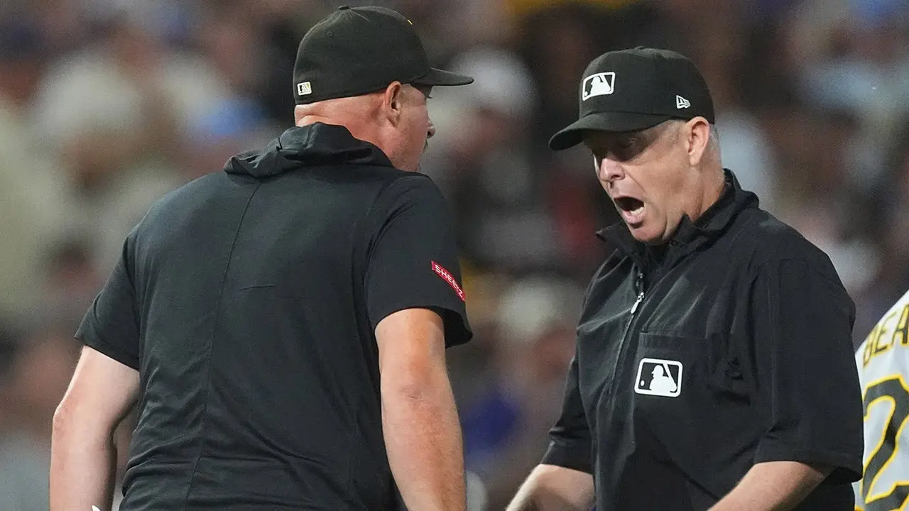 Rockies defeat Pirates due to a disputed interference call in the 9th inning.