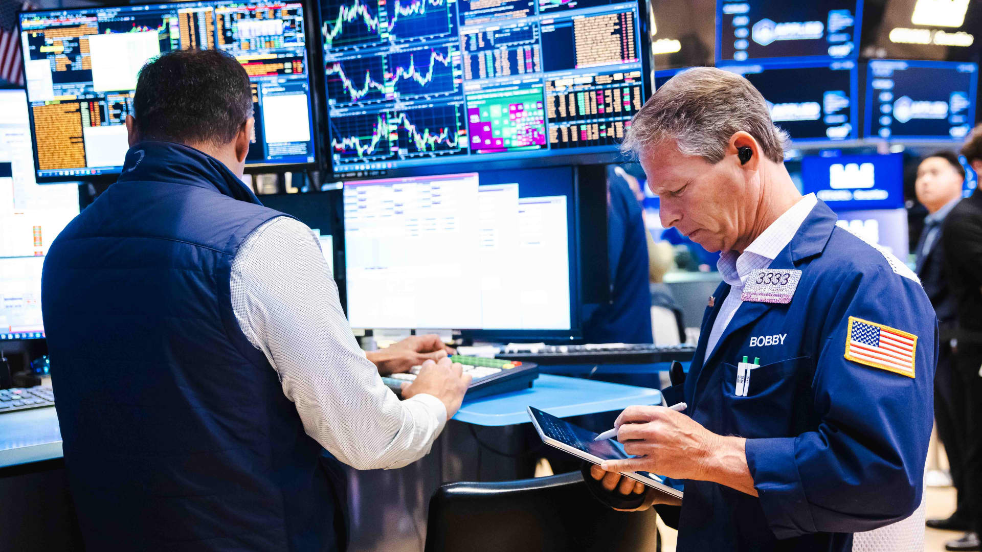 S&P 500 declines as Broadcom drives chip downturn, while the Dow rises 700 points in mixed market: Live updates
