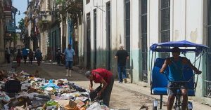 Sandro Castro, Fidel's grandson, advertises an exclusive summer party in the ruins of Cuba.