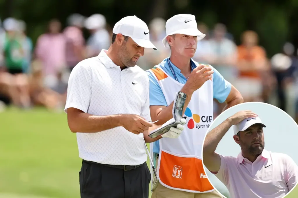 Scottie Scheffler expresses frustration at his caddie after his ball lands in the water at the Memorial.