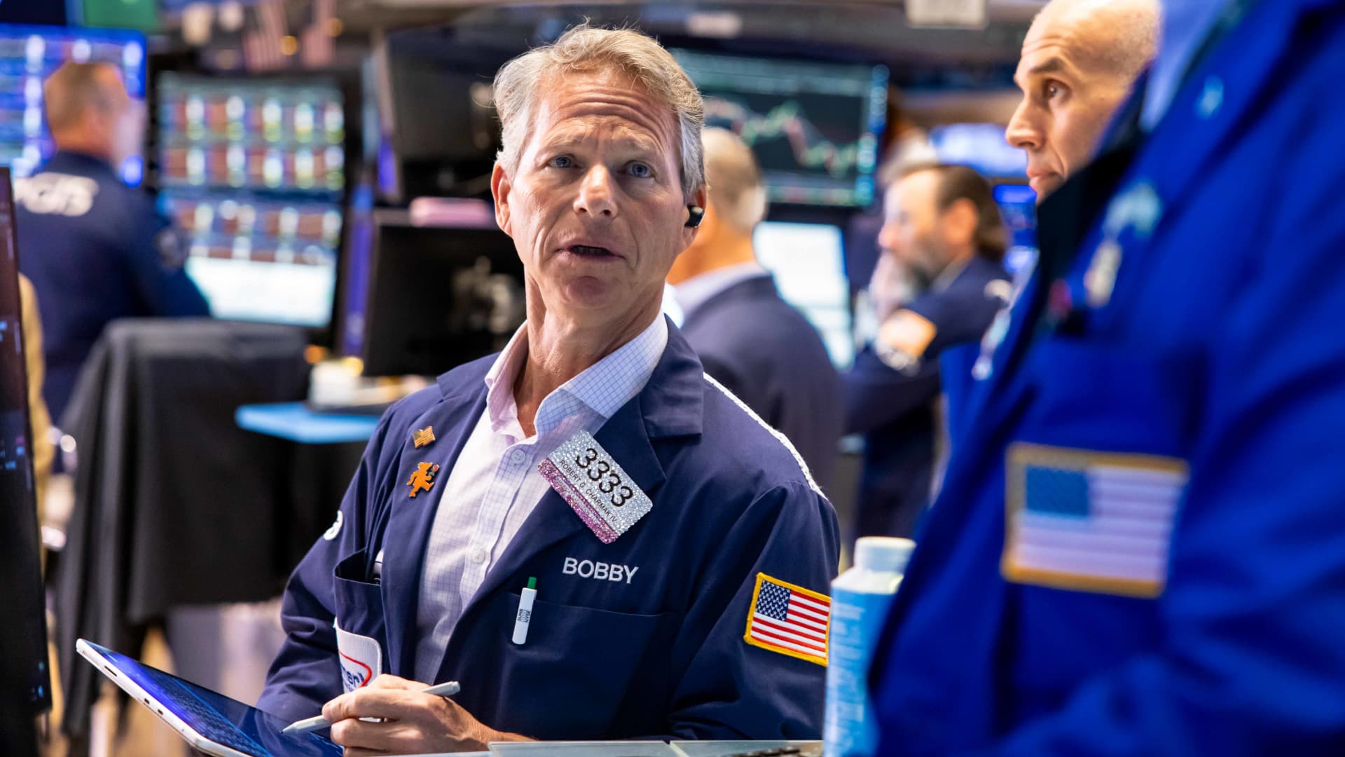 Stock futures remain mostly steady after the Dow reaches a new record close: Latest updates