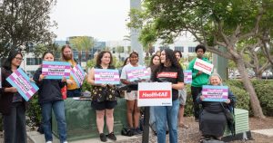Supporters gather in San Diego to oppose suggested cuts to Medi-Cal.