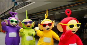 Teletubbies Perform for LGBTQ+ Rights at Beach Pride Party, Attract Attention as They Leave