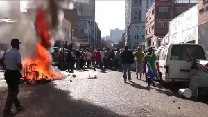 Thousands of police are sent in as anti-immigrant protests lead to 4 deaths in South Africa.