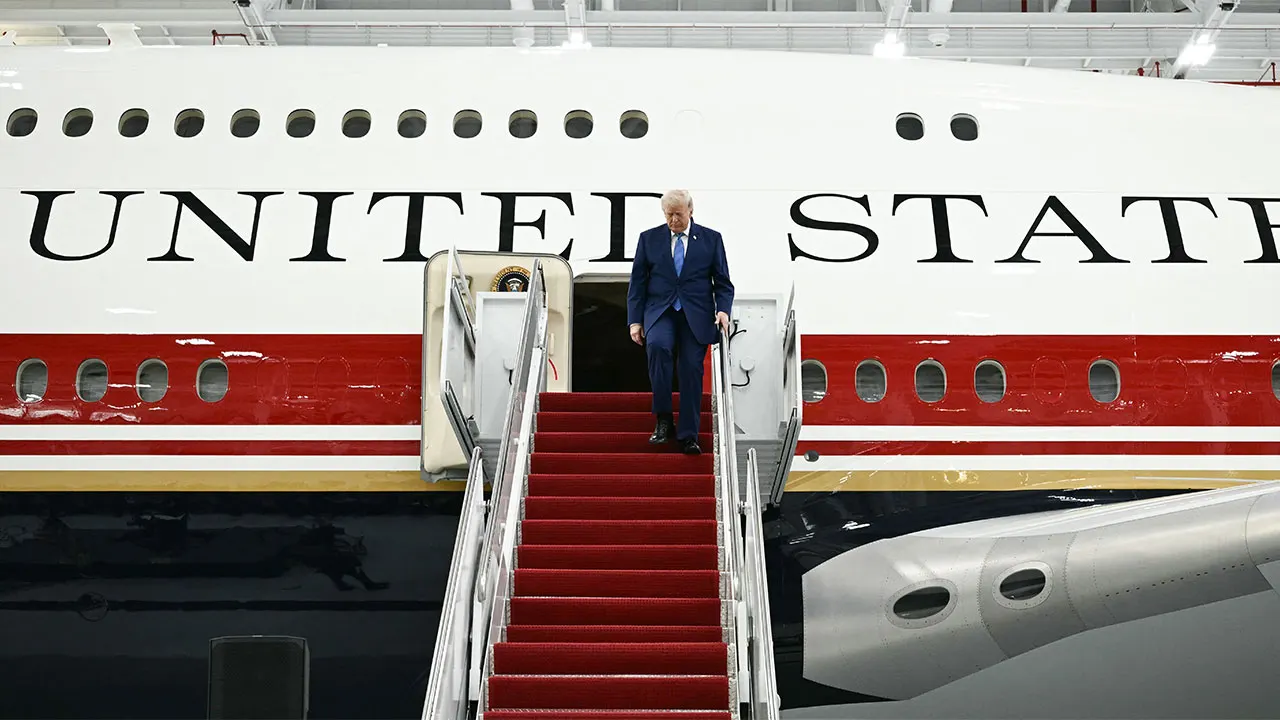 Trump reveals updated Air Force One featuring a fresh patriotic design.