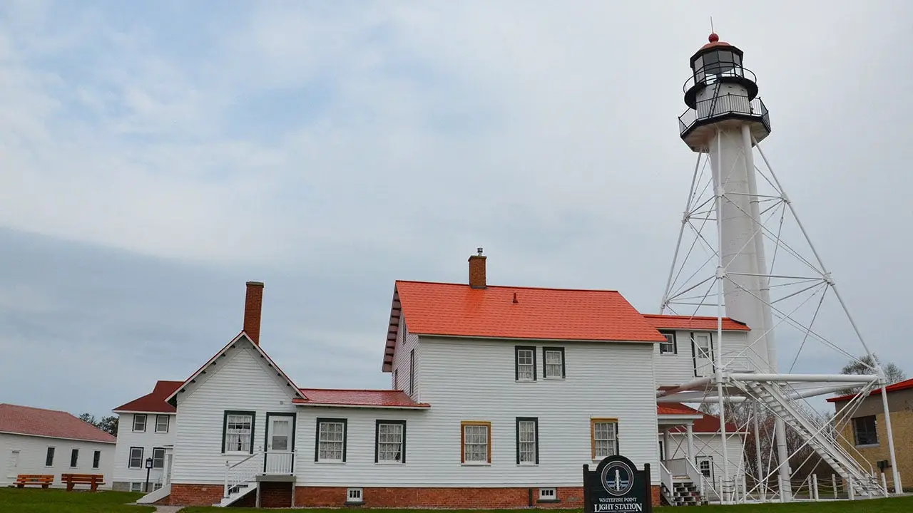 Two women, a dog, a lighthouse, and a potential Bigfoot sighting on a beach in Michigan