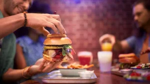 Upscale restaurants in LA, Boston, and NYC are restricting sales of premium burgers.