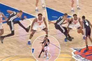Victor Wembanyama reaches for OG Anunoby's leg in NBA Finals Game 4